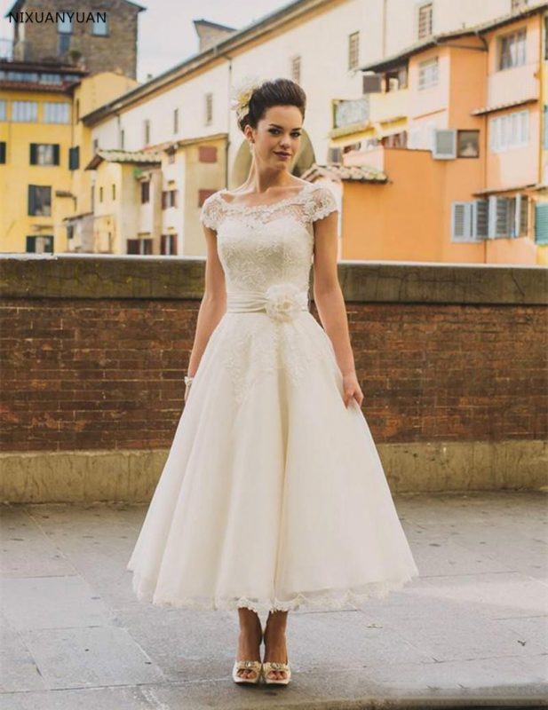 Robe de mariée courte ivoire Robe de mariée courte ivoire