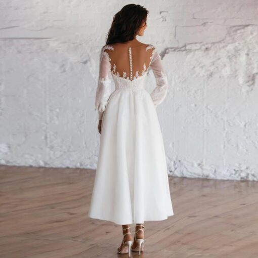Robe De Mariée Courte Et Chic Blanche