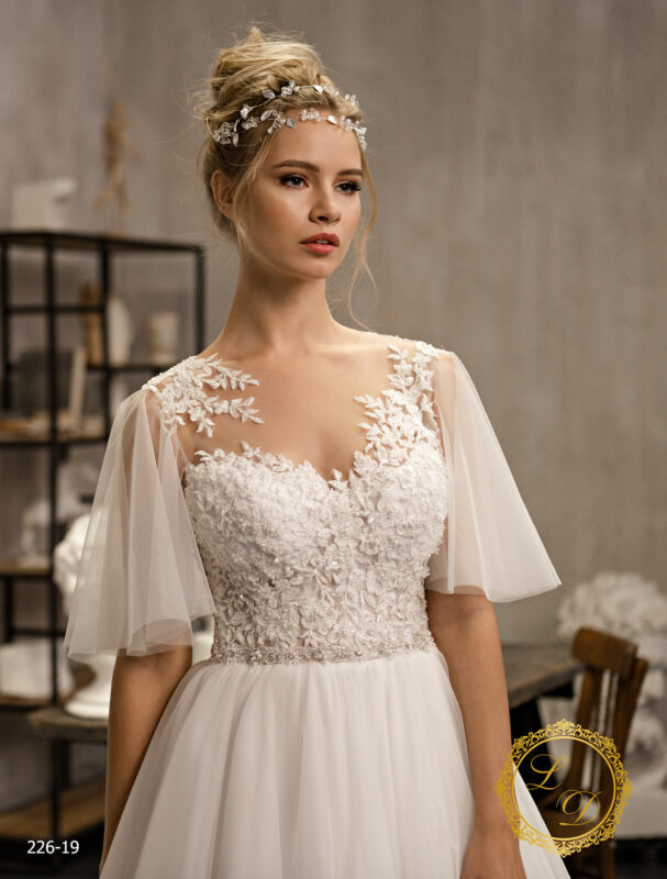 Robe de mariée dentelle manche