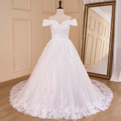 Robe De Mariée Princesse Fleurie Manche Tombante Blanche image 12 | Soirée Blanche