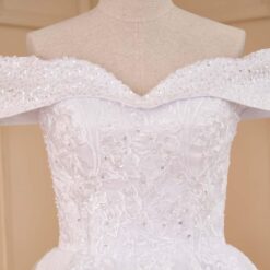 Robe De Mariée Princesse Fleurie Manche Tombante Blanche image 14 | Soirée Blanche