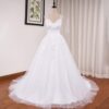Robe de mariée fourreau en dentelle avec bretelles spaghetti