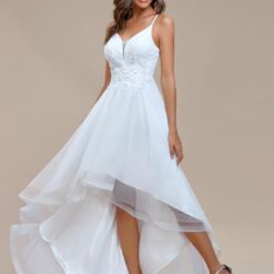 Robe de mariée col V plongeant avec motifs floraux image 14 | Soirée Blanche